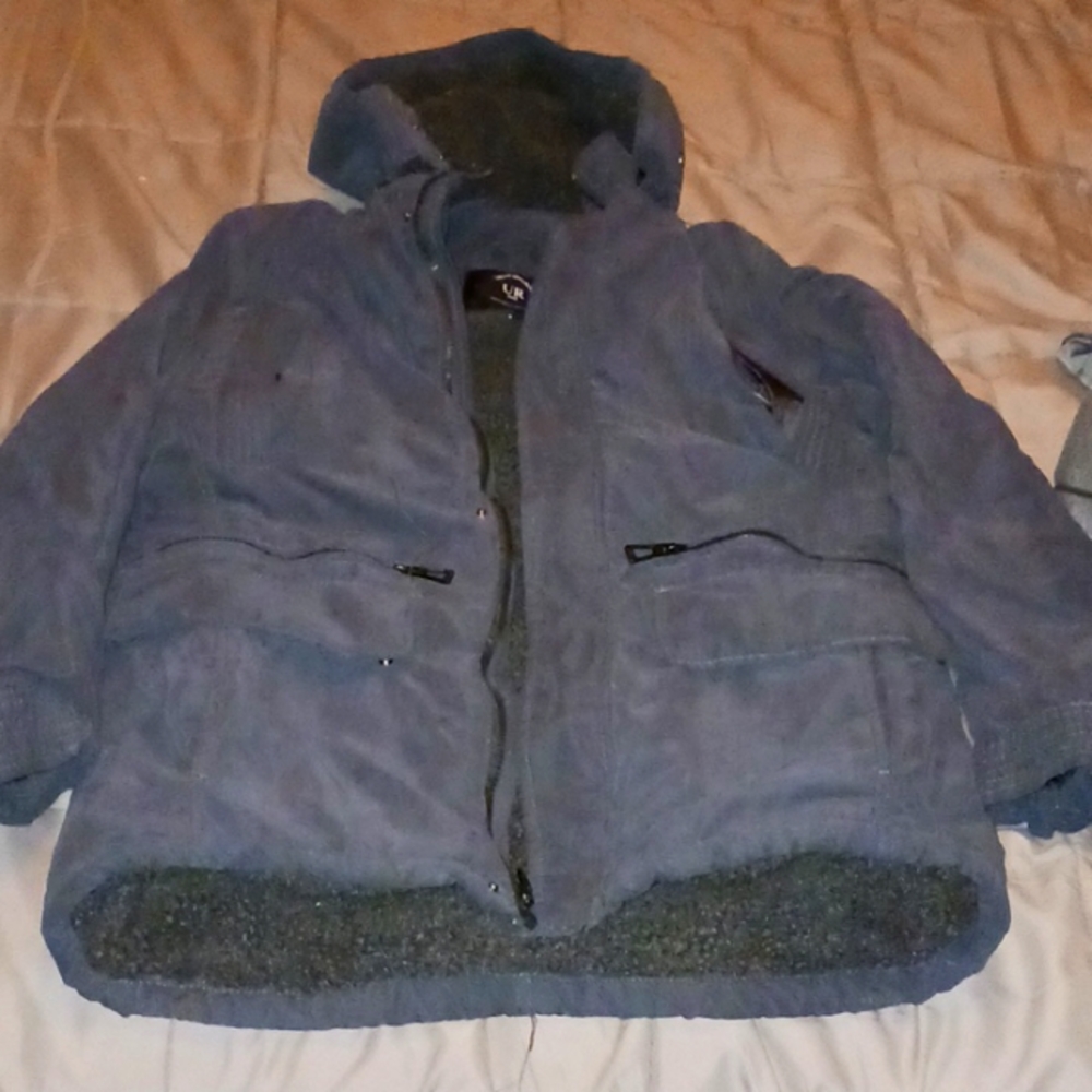 Small size. Fits like a medium but the arms are short.